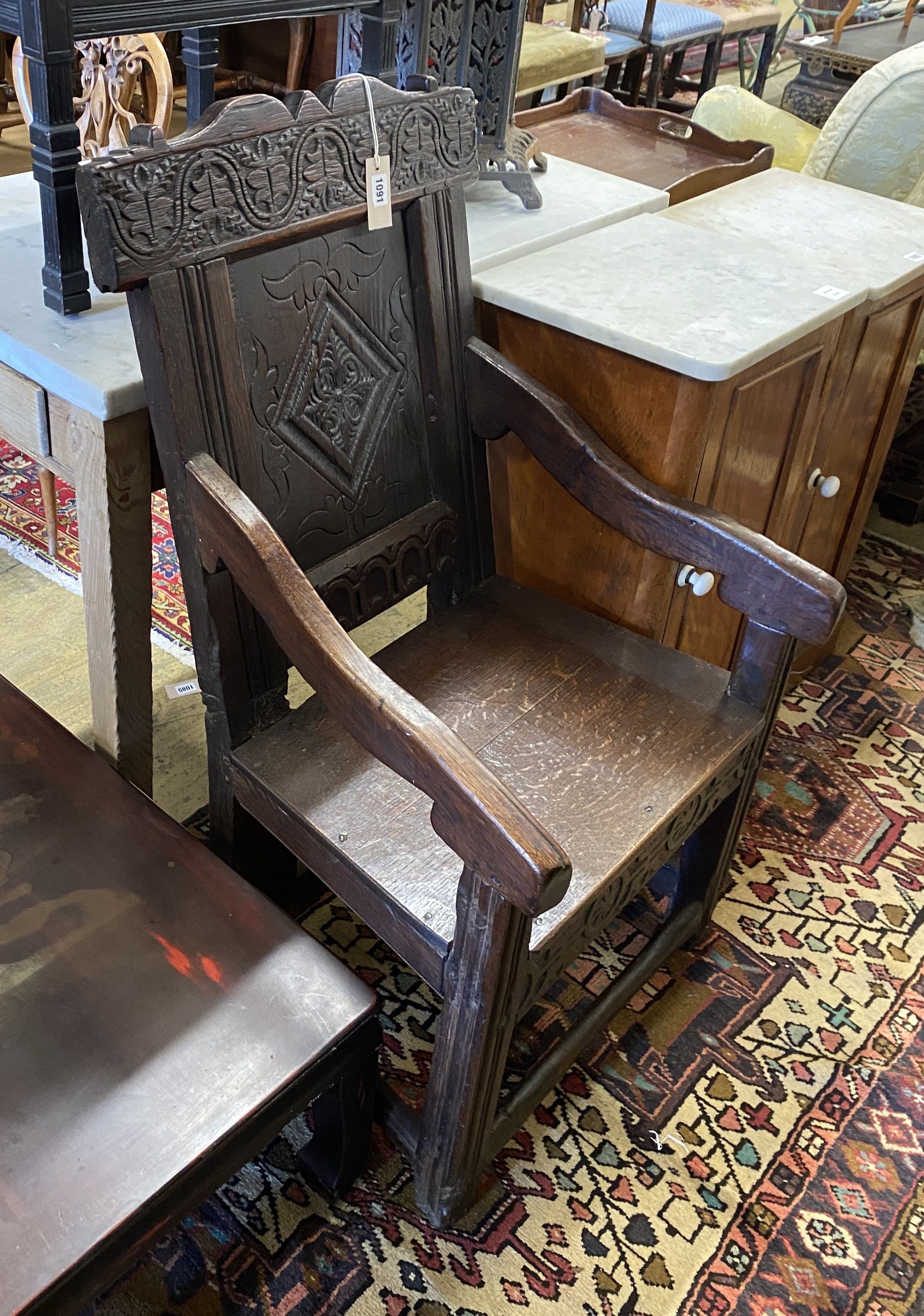 A 17th century and later oak wainscot chair, width 56cm, depth 54cm, height 100cm